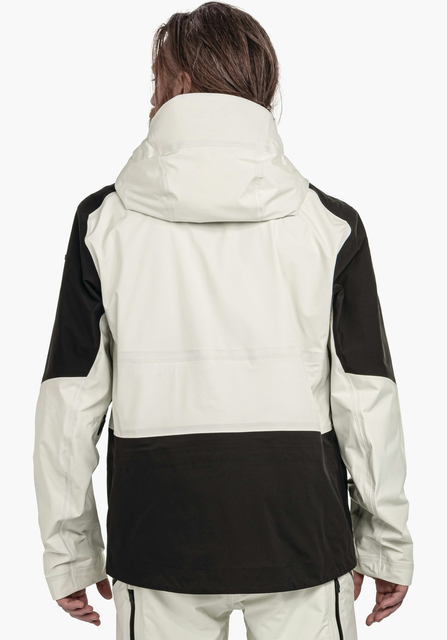 Shell Jk Style Lufeld MNS jacket (rear view); person wears an off-white jacket with black inserts; hood up, arms relaxed at the sides; neutral light background.