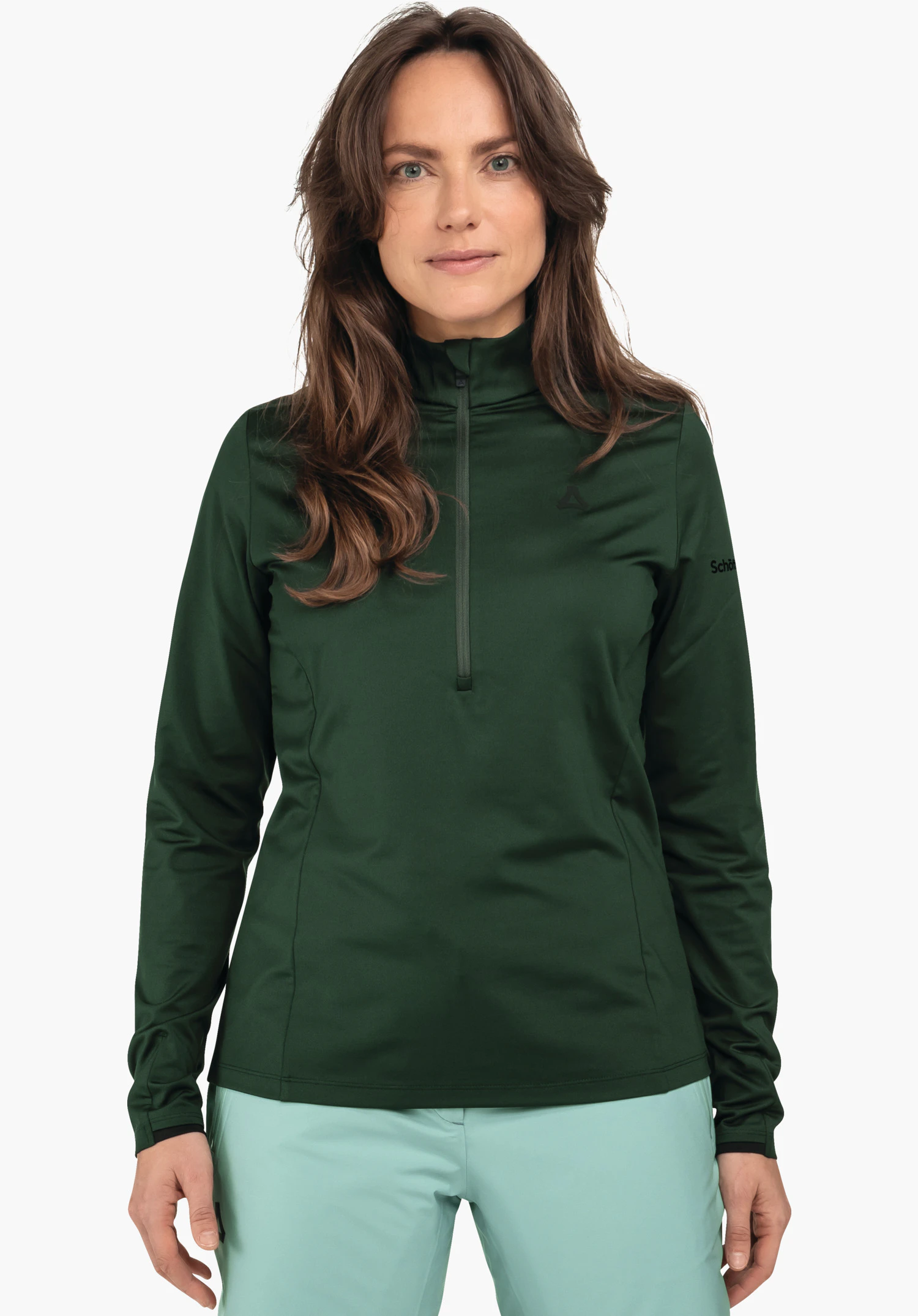 Longsleeve Style Pine WMS dark green long-sleeve jumper worn by a person standing front-facing against a white background; light blue trousers; Schöffel logo on the chest; lettering: Schöffel.