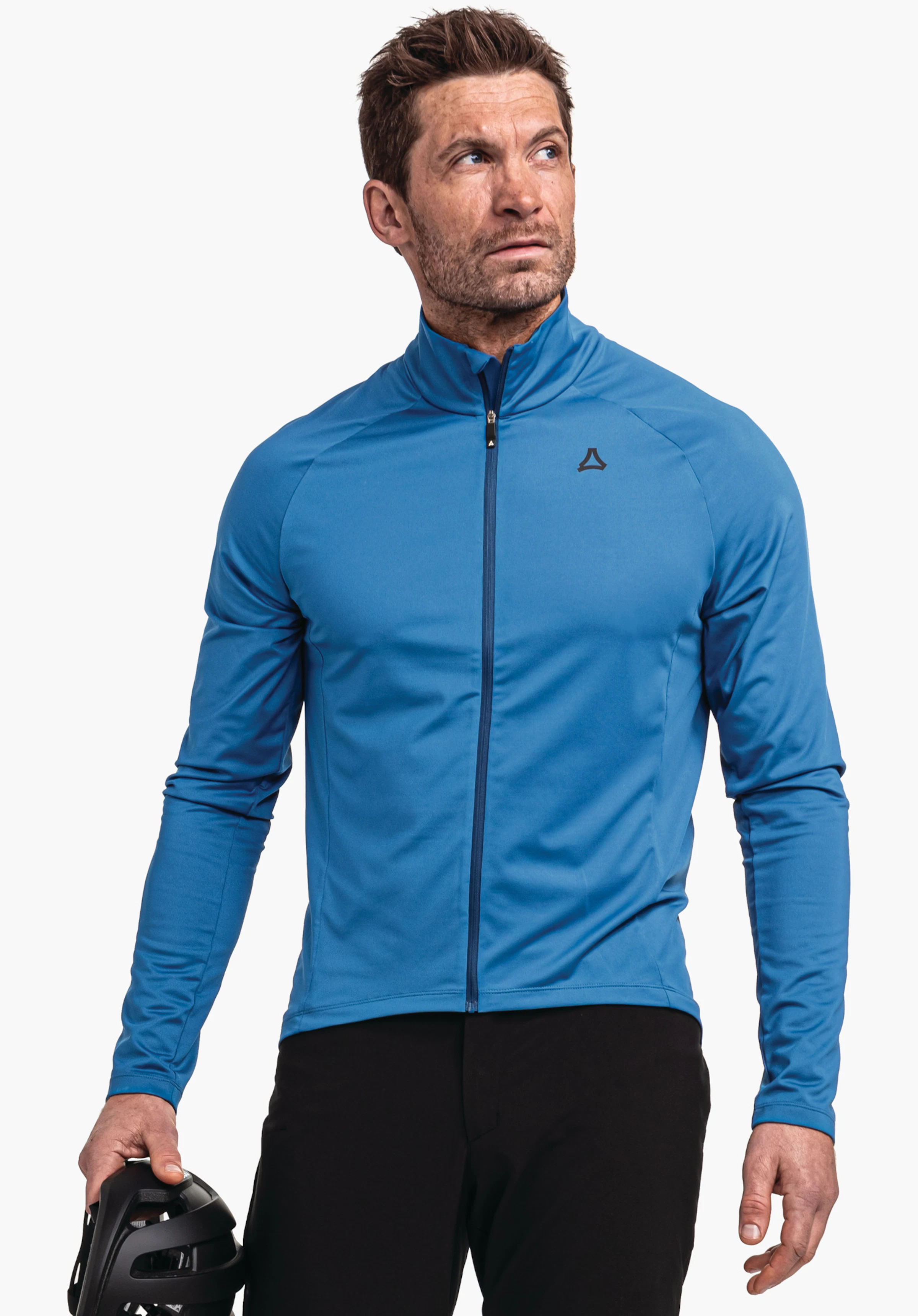 Longsleeve Style Kubena MNS blue sports jacket worn by a man holding a black bicycle helmet in the left hand; Schöffel logo on the chest; white studio background.