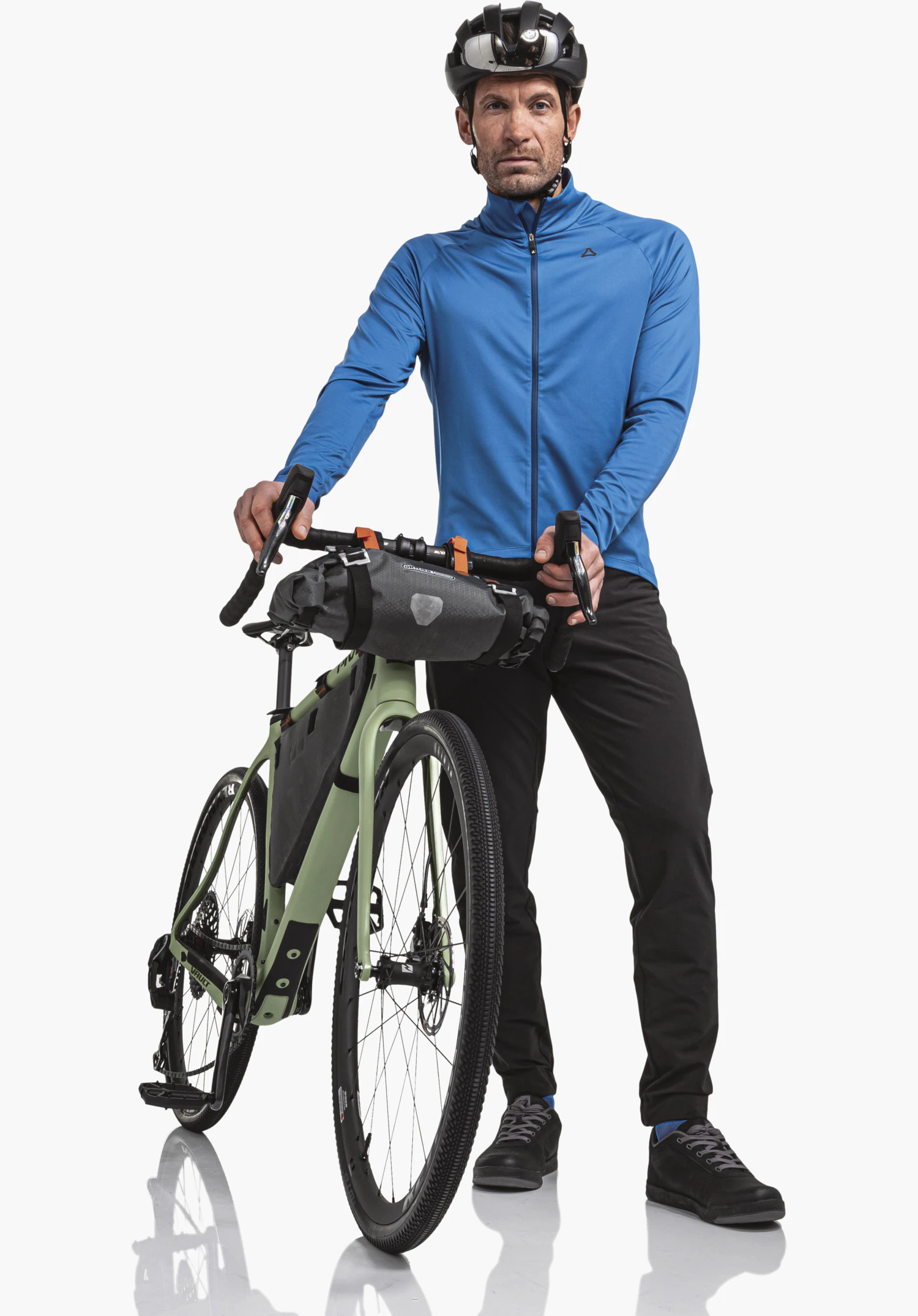 Longsleeve Style Kubena MNS showing the blue standing collar with front zip and the Schöffel logo on the left chest, close-up against a white background.