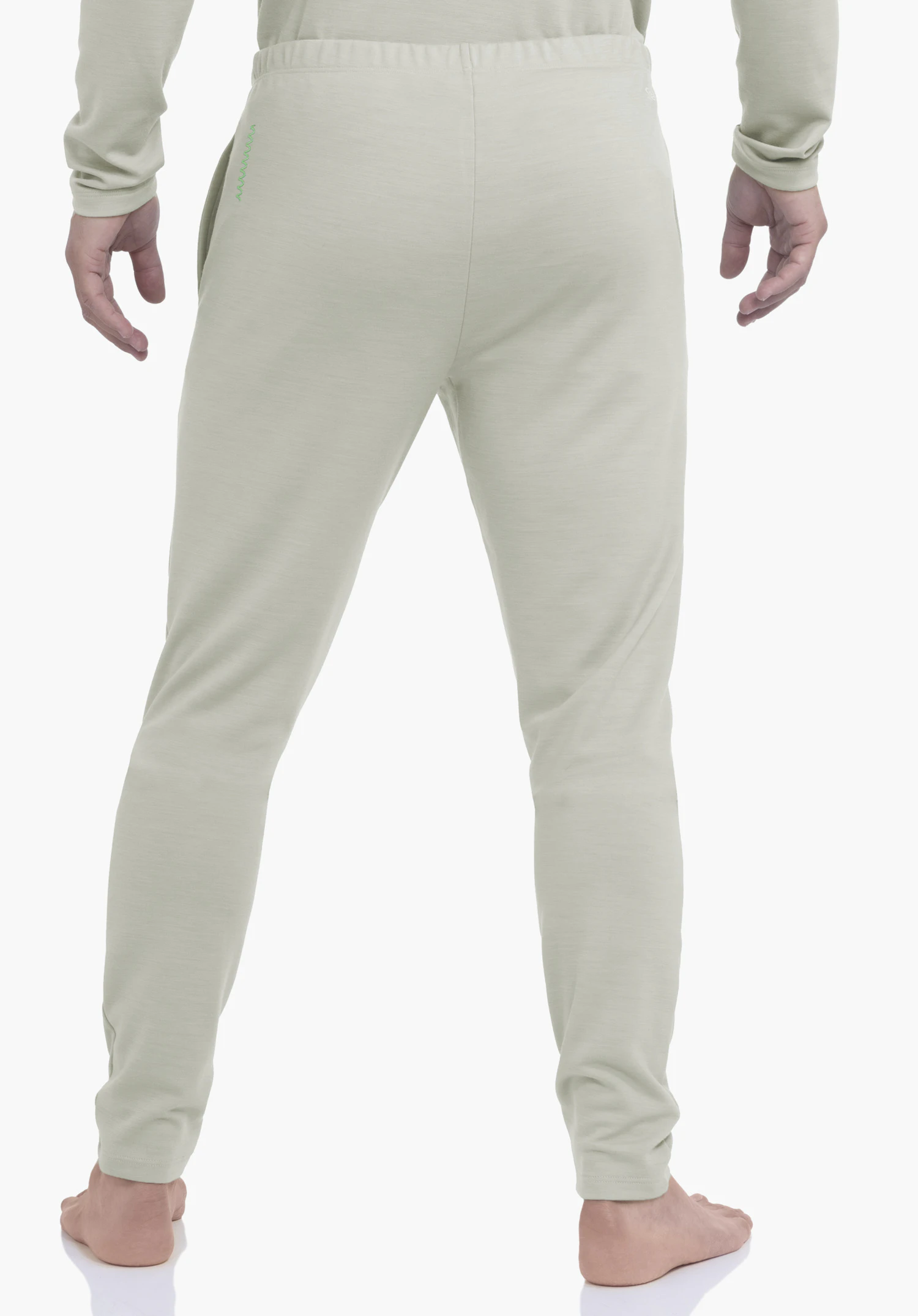Pants Style Canyfer MNS light green jogging trousers, rear view, worn by a standing barefoot person; hands at the sides, elastic waistband, subtle green decorative stitching on the right pocket; white background.