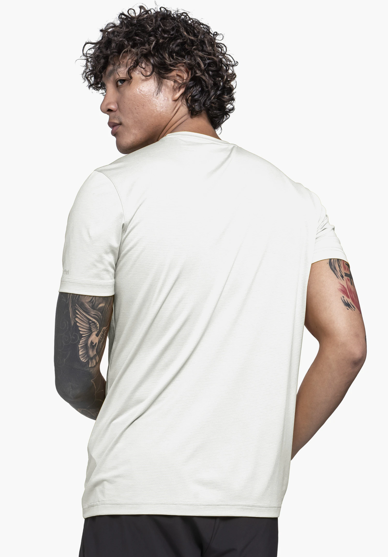 T Shirt Style Chipoma MEN in wit getoond vanaf de achterkant tegen een neutrale achtergrond, waarbij het subtiele Schöffel-logo op de mouw zichtbaar is.