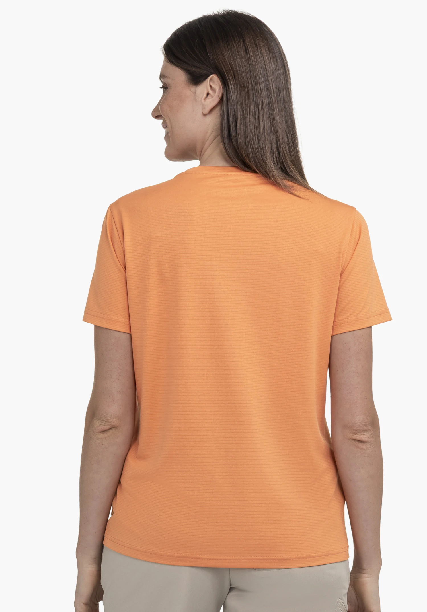 T Shirt Style Chipoma WMN is shown from the back against a neutral background. The model wears the top in a vibrant orange, highlighting its clean design and high-quality fabric.