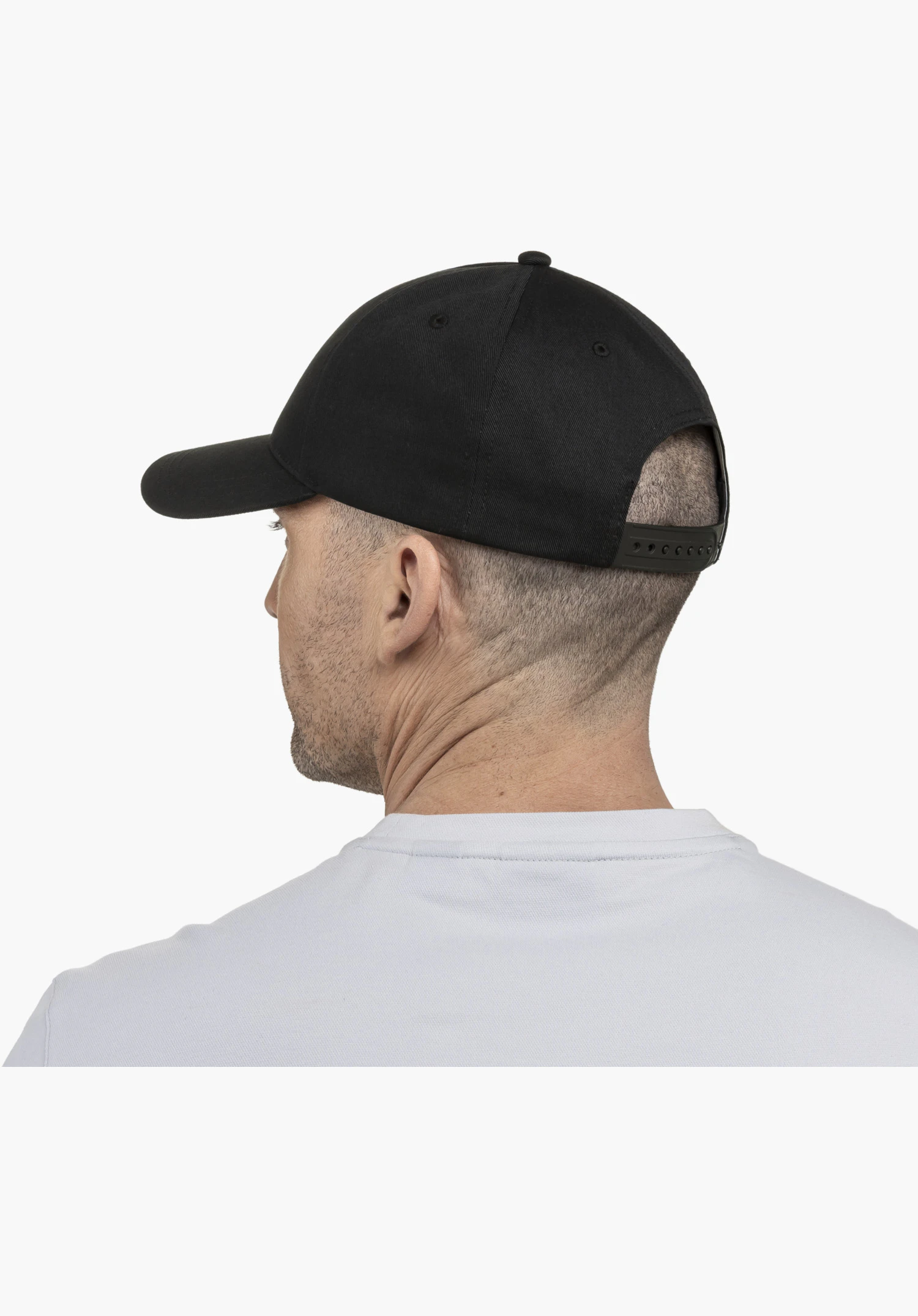 Cap Style Collada UNI shows the black, adjustable snapback closure on the back of the head of a male model, close-up against a white/neutral background.
