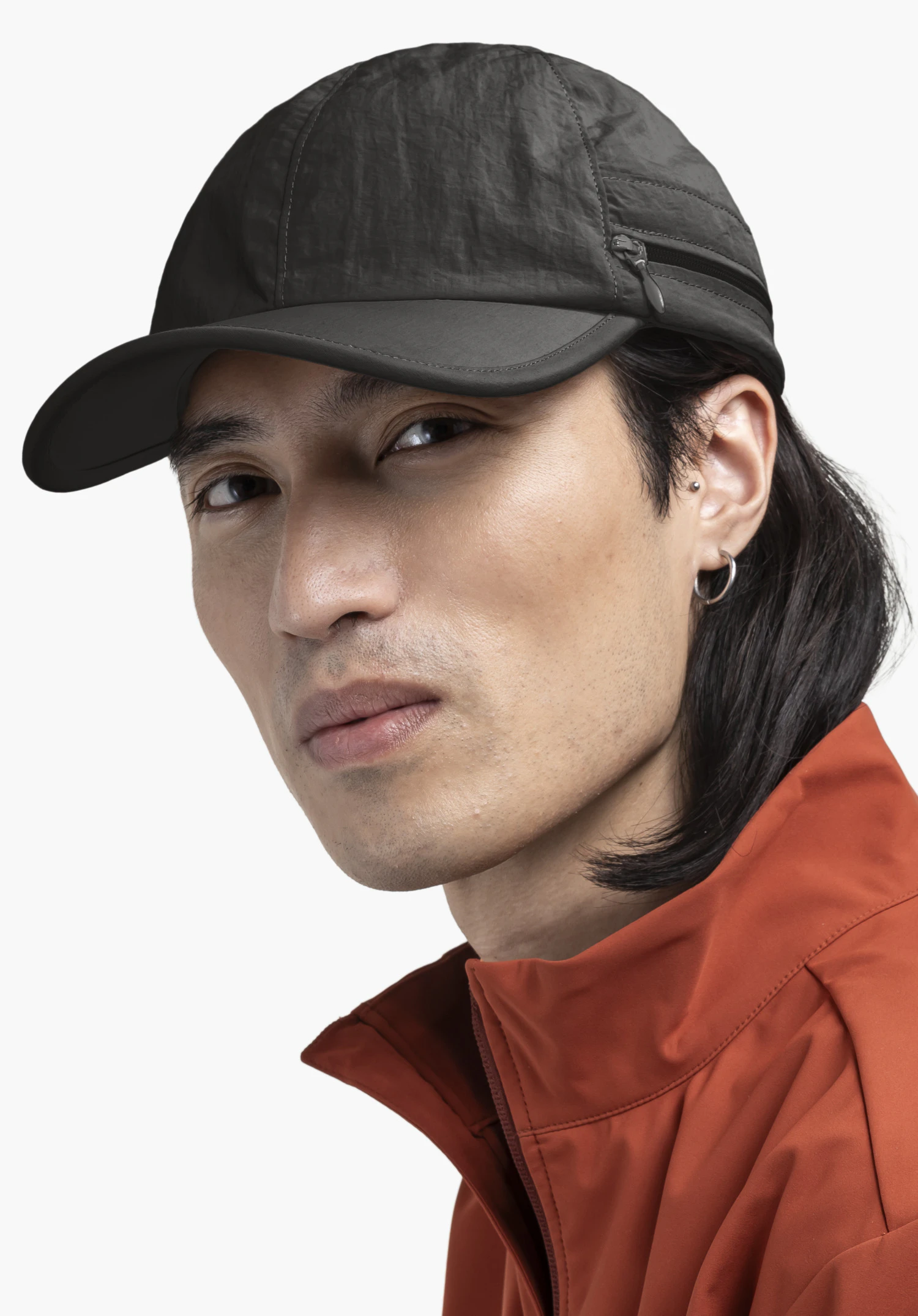 Cap Style Dalfoss UNI worn by a model in grey, portrait view against a neutral background.