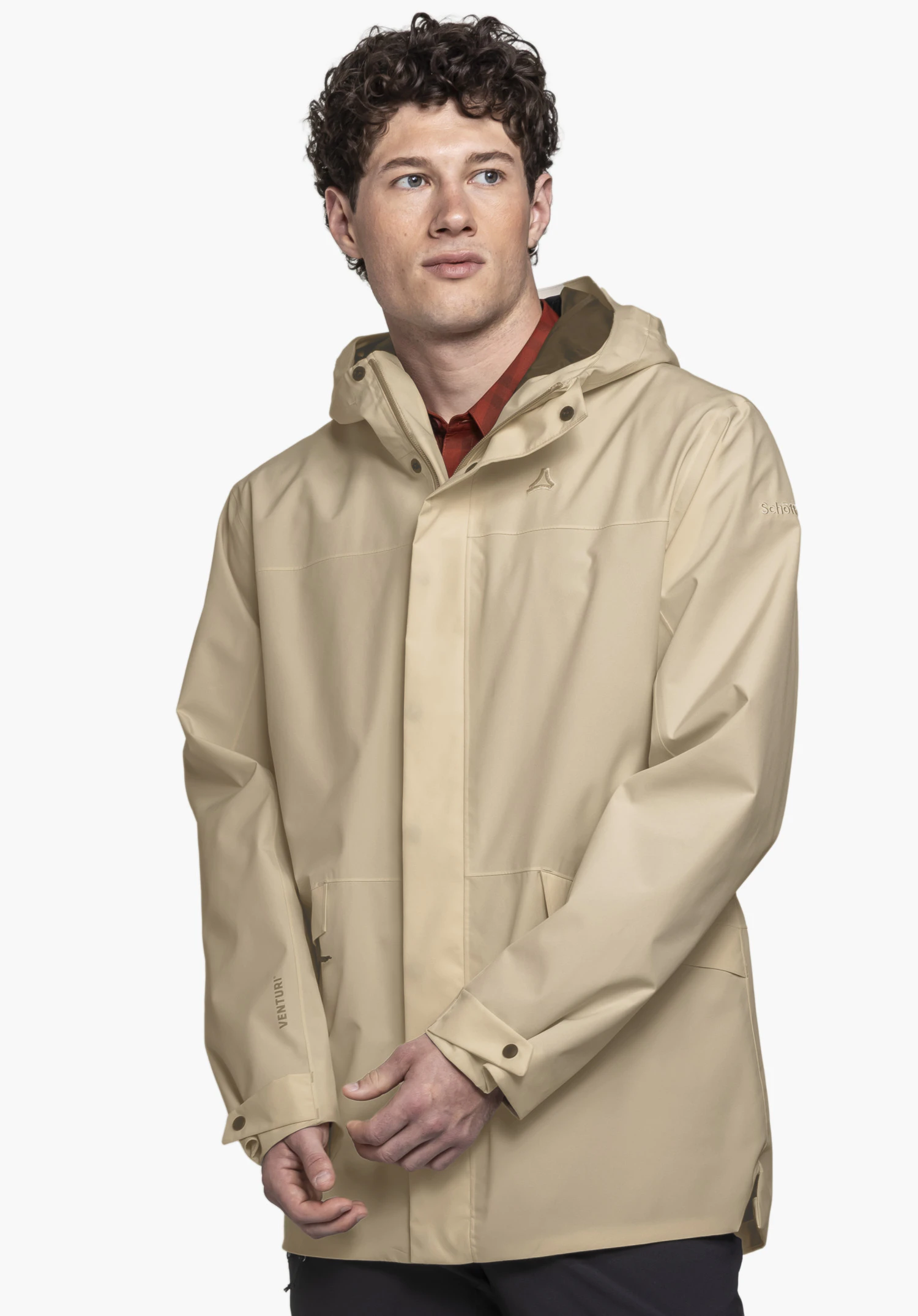 CIRC Jacket Style Smue MEN worn by a model standing slightly to the side. The beige jacket features the Schöffel logo on the chest, photographed against a neutral background.