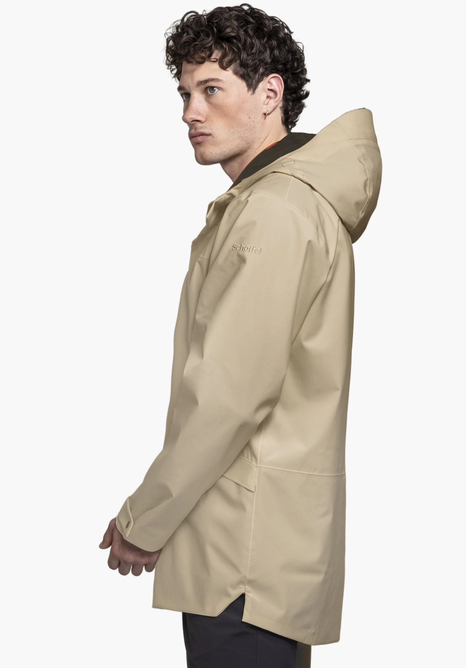 CIRC Jacket Style Smue MEN in beige: A model is shown in profile against a neutral background, wearing the hooded jacket. The subtle Schöffel logo is visible on the shoulder.