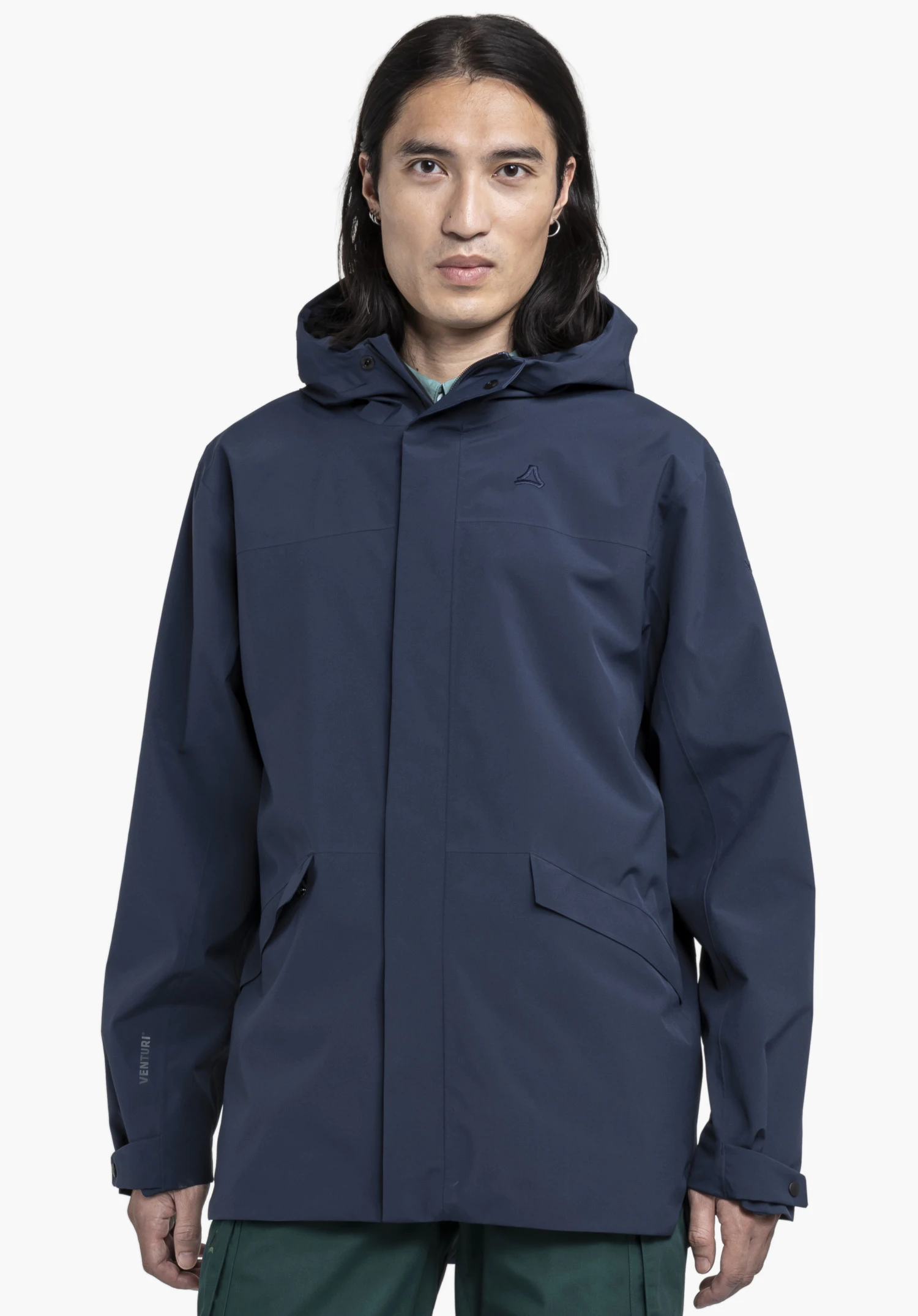 CIRC Jacket Style Smue MEN, worn by a model in a front view. The blue jacket features the Schöffel logo on the left chest. The model stands straight and faces forwards against a neutral background.
