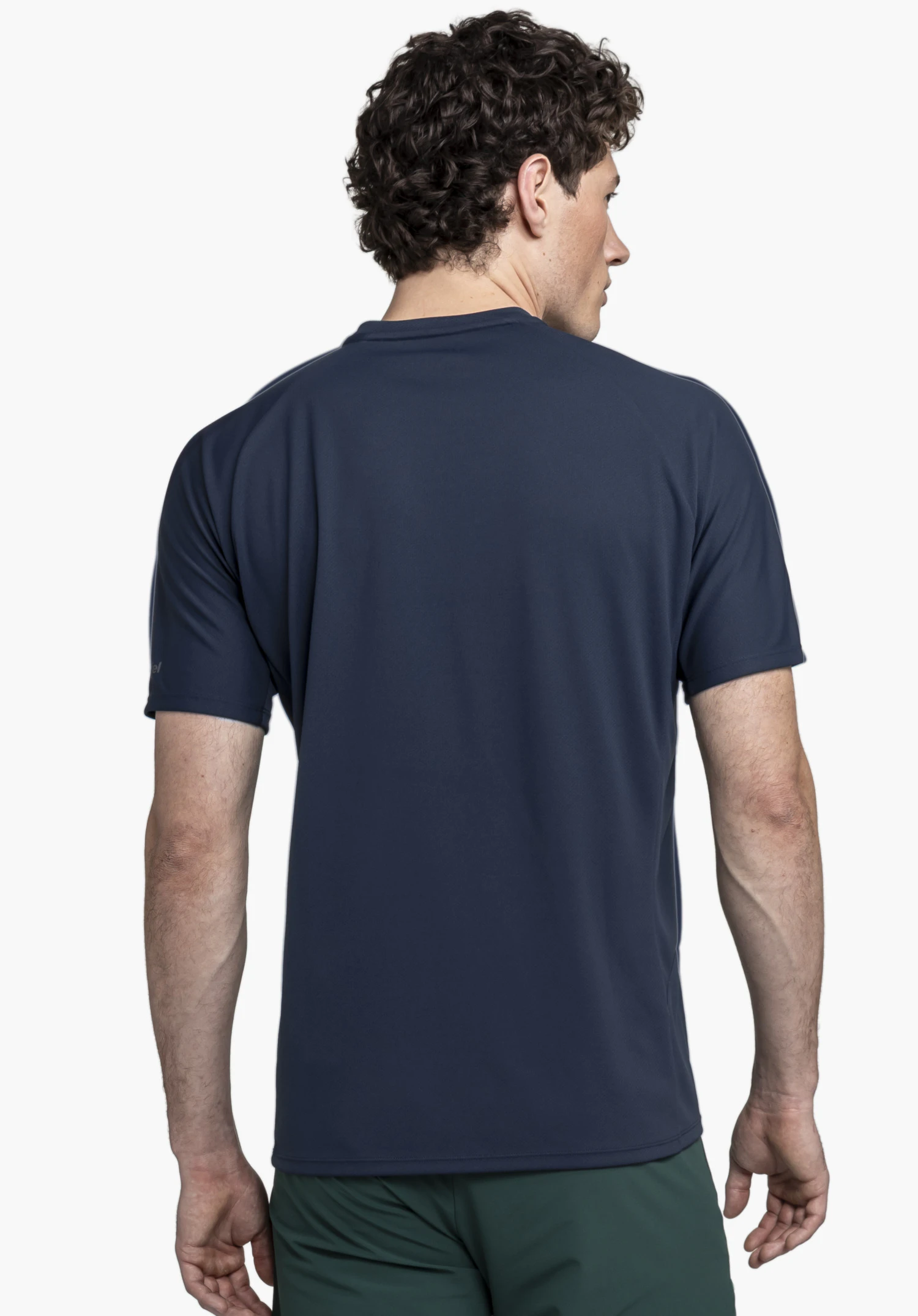 T Shirt Style Enixa MEN présenté de dos sur un mannequin devant un fond neutre. Le t-shirt bleu souligne une allure sportive, avec le logo Schöffel discrètement visible sur la manche.