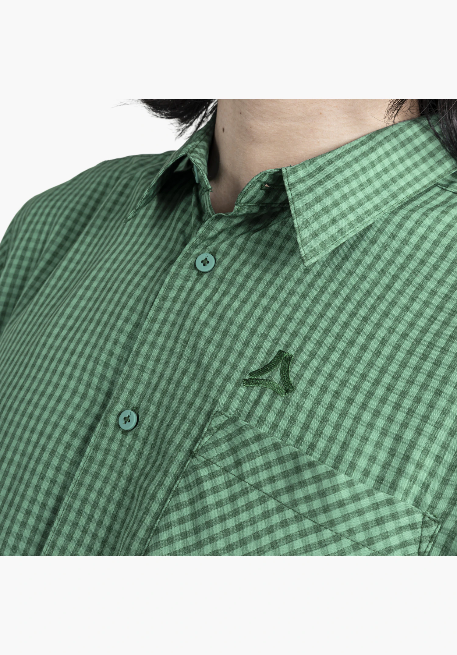 CIRC Shirt Style Dalfoss MEN shown here in detail. The focus is on the green, finely checked fabric, the button placket with colour-matching buttons and the embroidered Schöffel logo on the chest. Close-up against a white/neutral background.