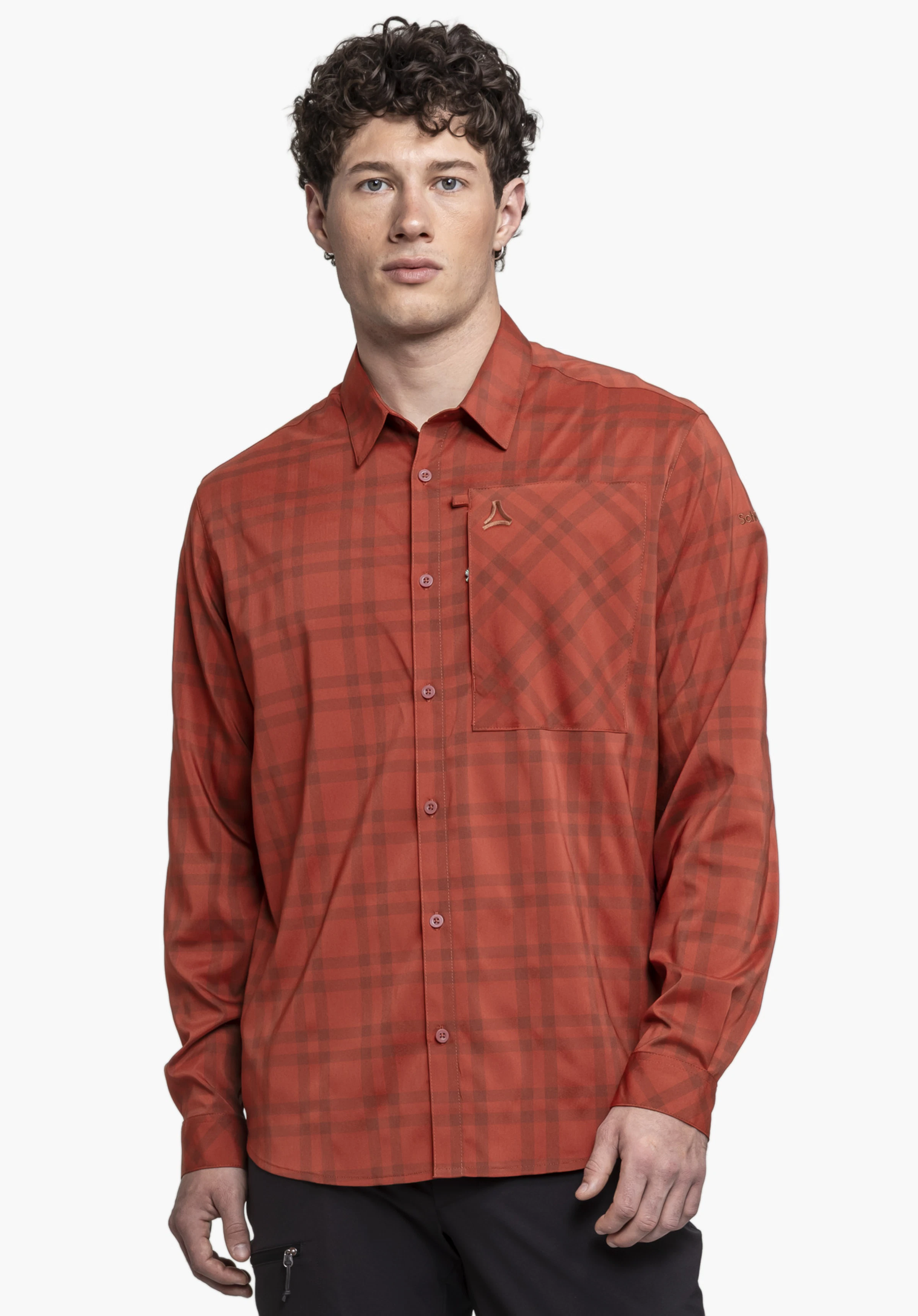Shirt Style Fraris MEN in red, shown in a frontal view against a neutral background. The focus is on the checkered pattern and the subtly placed Schöffel logo on the chest pocket, highlighting the functional yet stylish outdoor look.