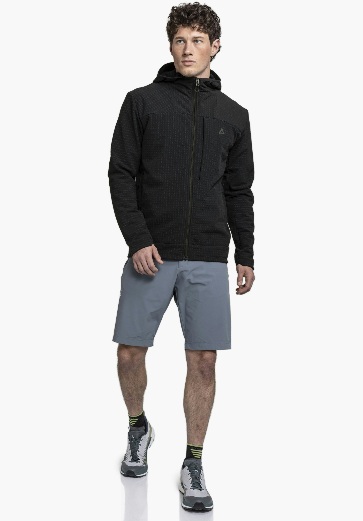 Fleece Hoody Style Enixa MEN showing the textured black fleece fabric, the front zip, and the subtle Schöffel logo on the chest, close-up against a white/neutral background.