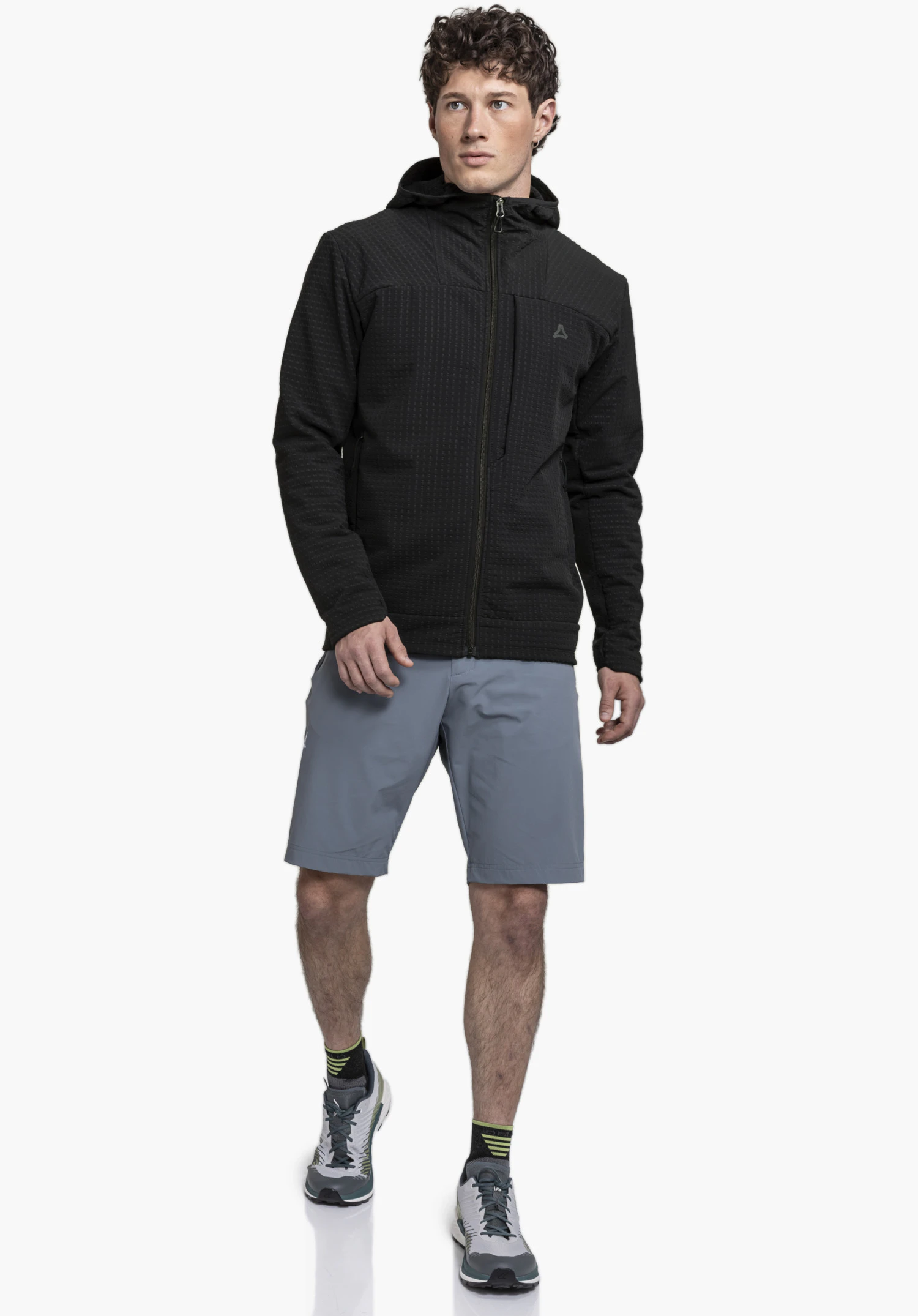 Fleece Hoody Style Enixa MEN showing the textured black fleece fabric, the front zip, and the subtle Schöffel logo on the chest, close-up against a white/neutral background.