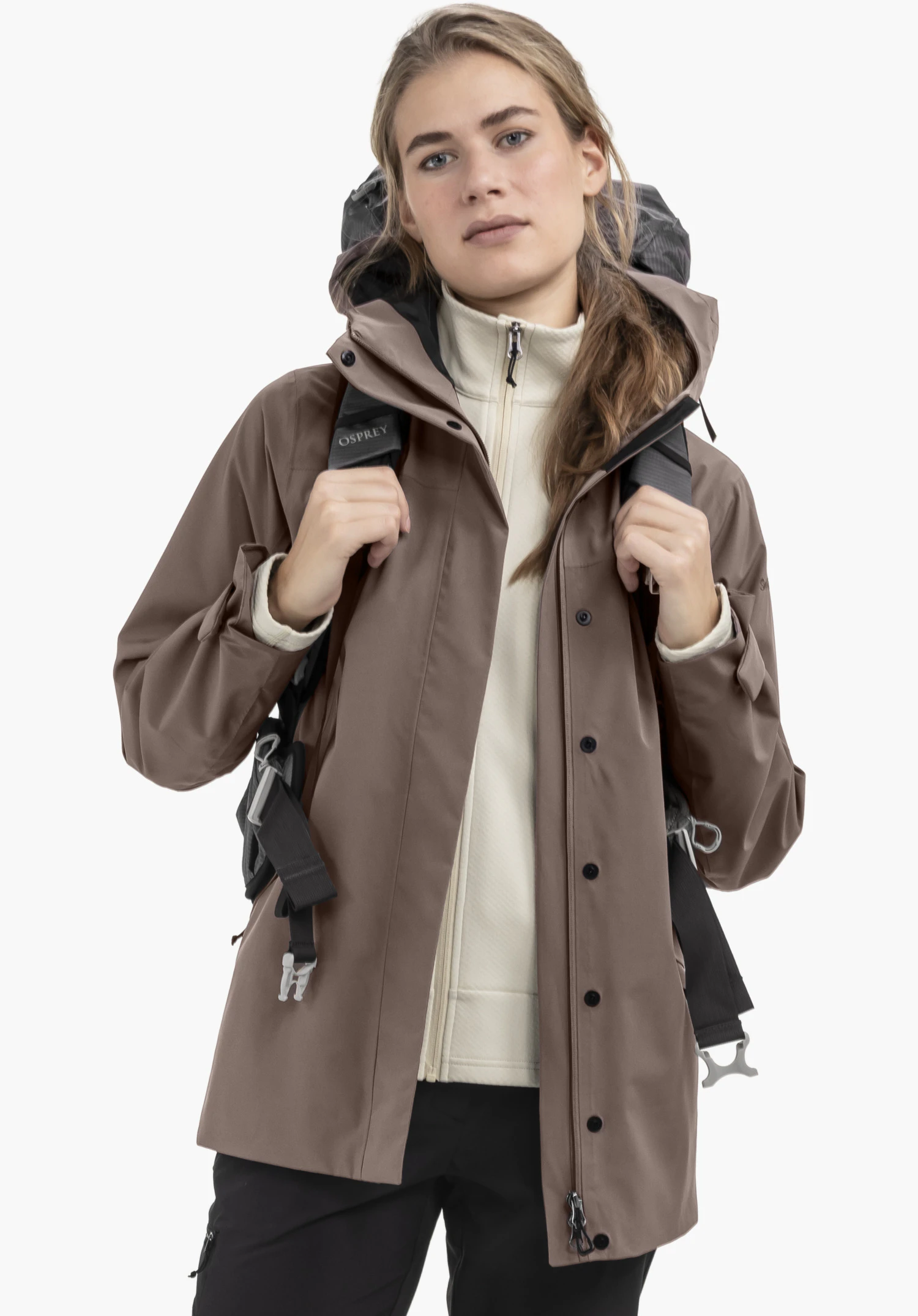 CIRC Jacket Style Smue WMN features the front placket with black press studs on the brown fabric as well as the subtle Schöffel logo on the sleeve, close-up against a white/neutral background.