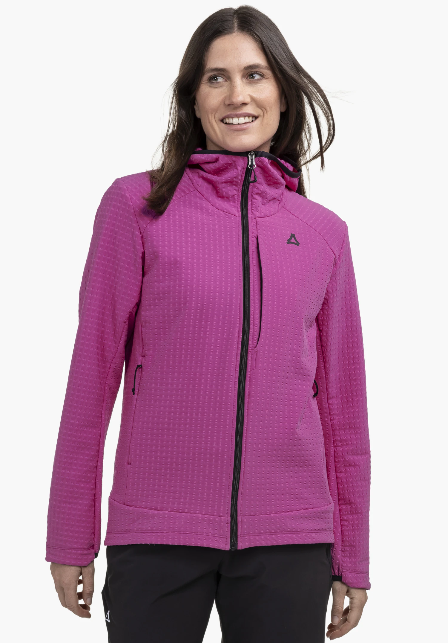 Fleece Hoody Style Enixa WMN is worn by a model standing frontally. The jacket in pink features a black front zip and the Schöffel logo on the left chest, presented against a neutral background.