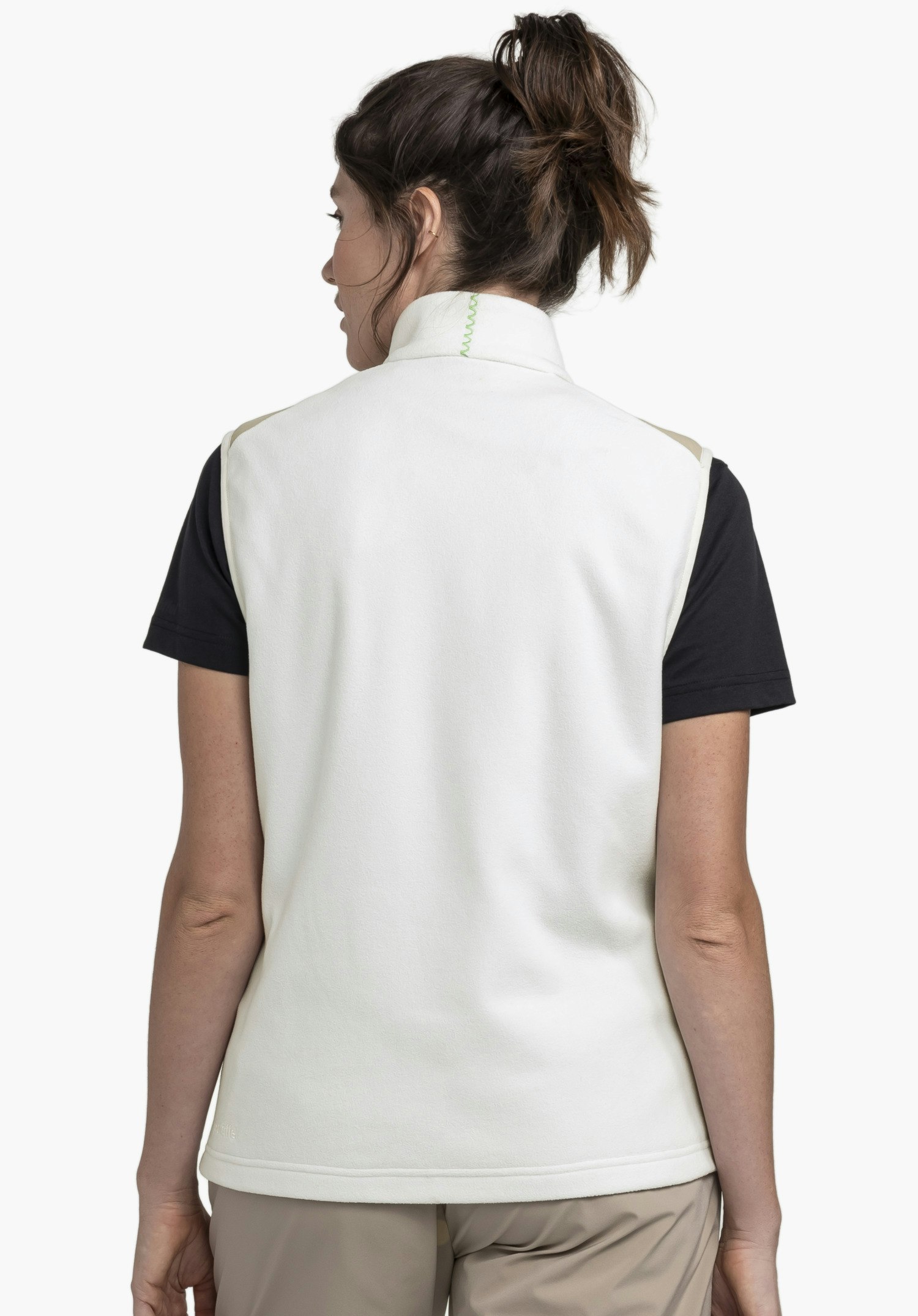 Fleece Vt Style Ash WMN in der Farbe natur, gezeigt in der Rückenansicht an einem Model vor neutralem Hintergrund mit dezentem Schöffel-Logo am unteren Saum.