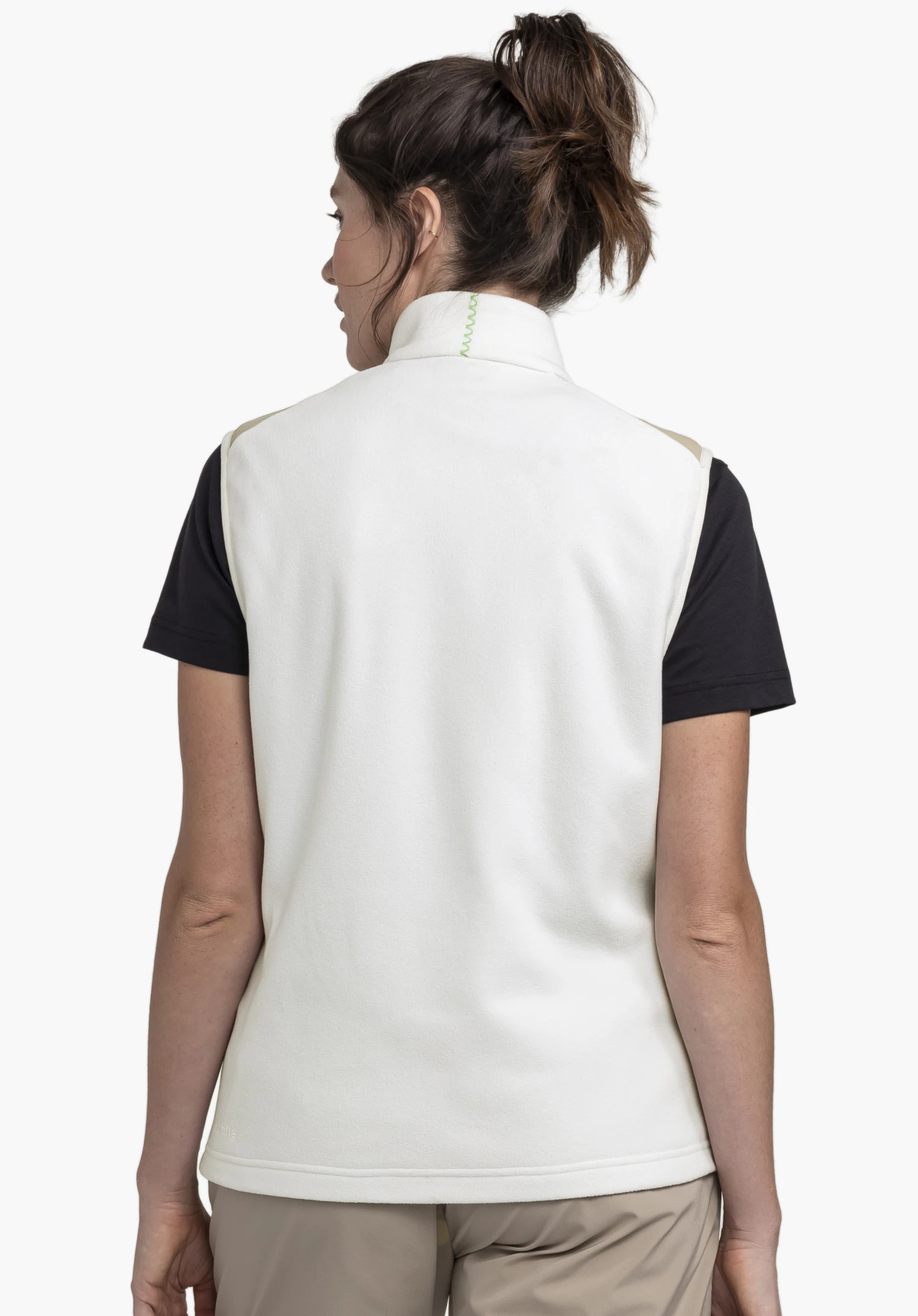 Fleece Vt Style Ash WMN in de kleur natur, getoond in achteraanzicht op een model tegen een neutrale achtergrond met een subtiel Schöffel-logo op de zoom.