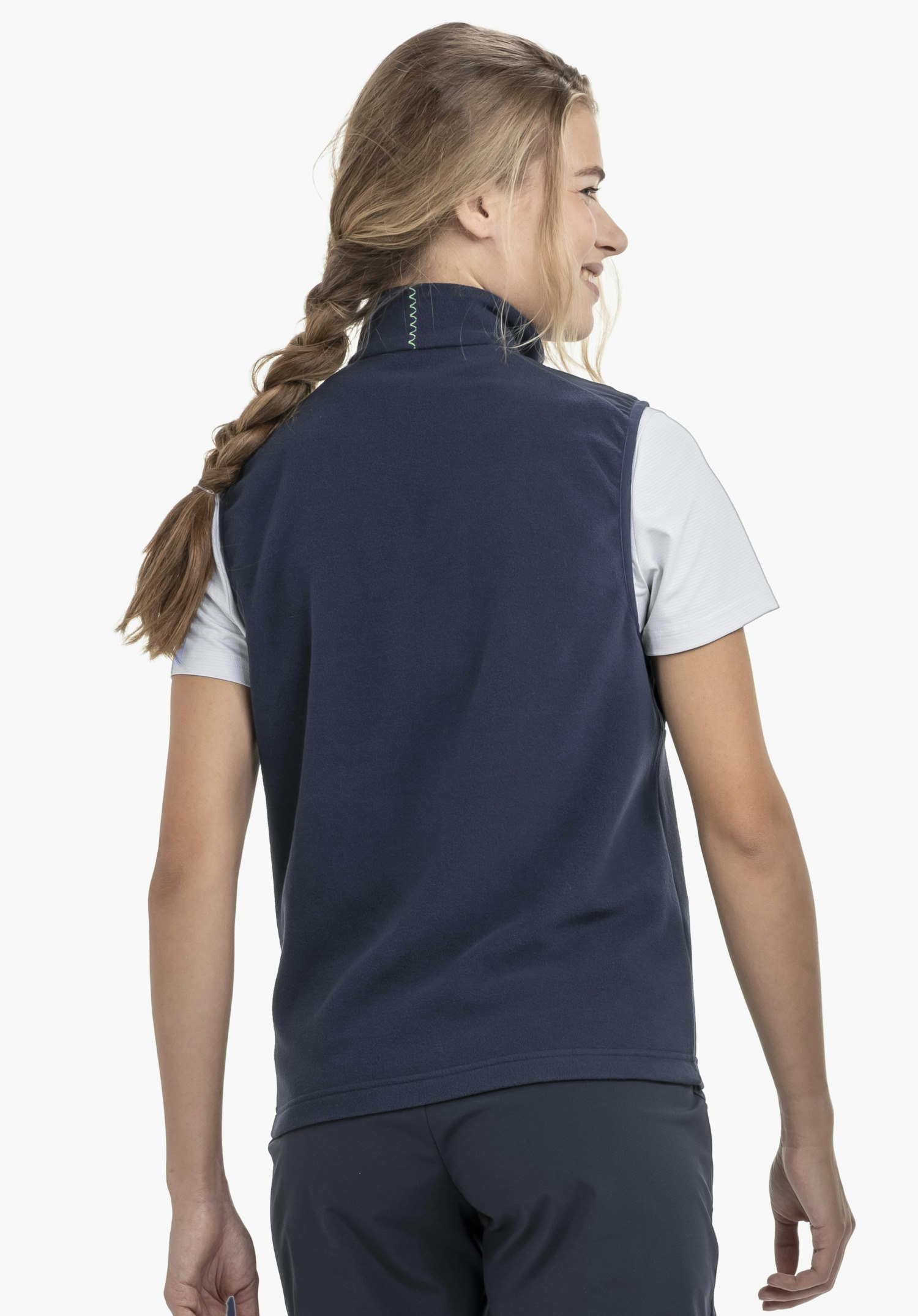 Fleece Vt Style Ash WMN. The model presents the blue fleece gilet in a back view against a neutral background.