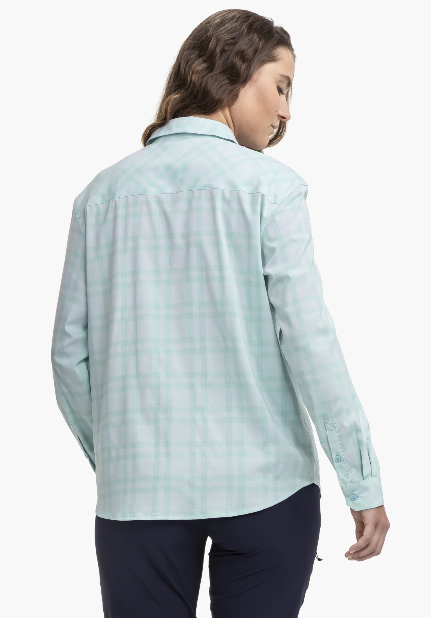 Blouse Style Fraris WMN. A model in back view wears the checked blouse in blue, standing slightly to the side against a neutral background.