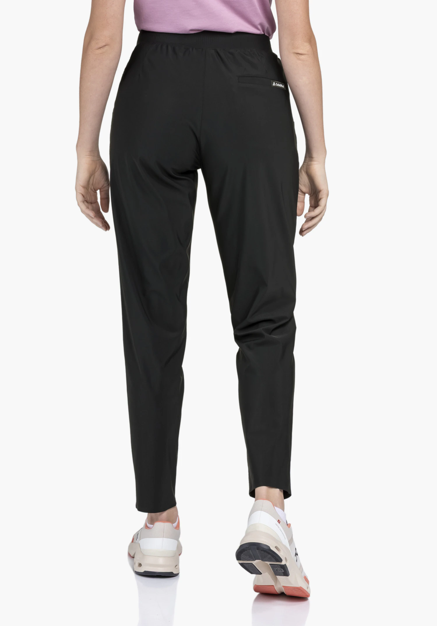 Jersey Pants Style Calmay WMN vue de dos en couleur schwarz sur un fond neutre, avec le logo Schöffel visible sur la poche arrière.
