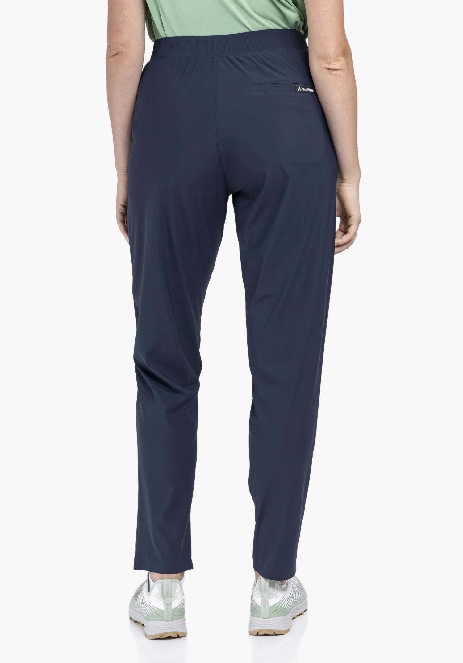 Jersey Pants Style Calmay WMN en bleu en vue de dos sur un fond neutre avec le logo Schöffel visible.