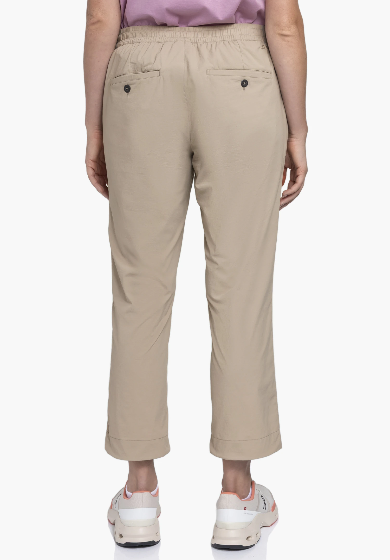 Pants Rangun L in beige shown from the rear on a model against a neutral background with the Schöffel logo visible above the right back pocket.