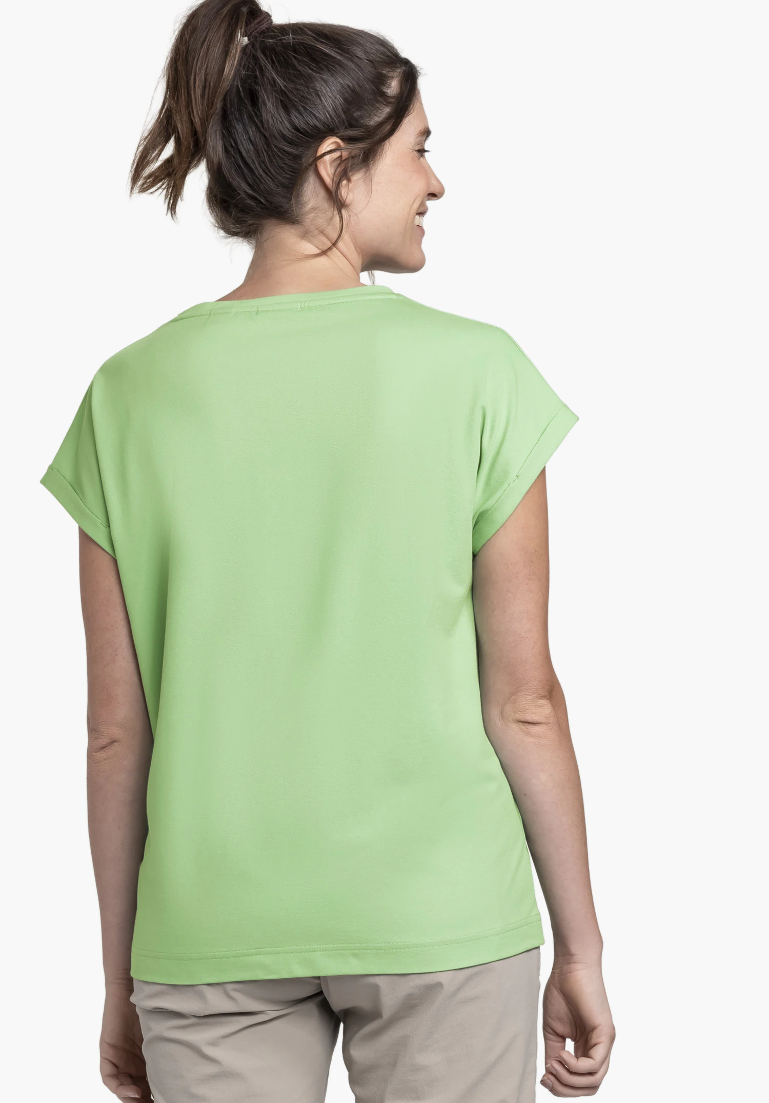 T Shirt Style Serenio WMN in green, shown from a back view against a neutral background, worn by a model.