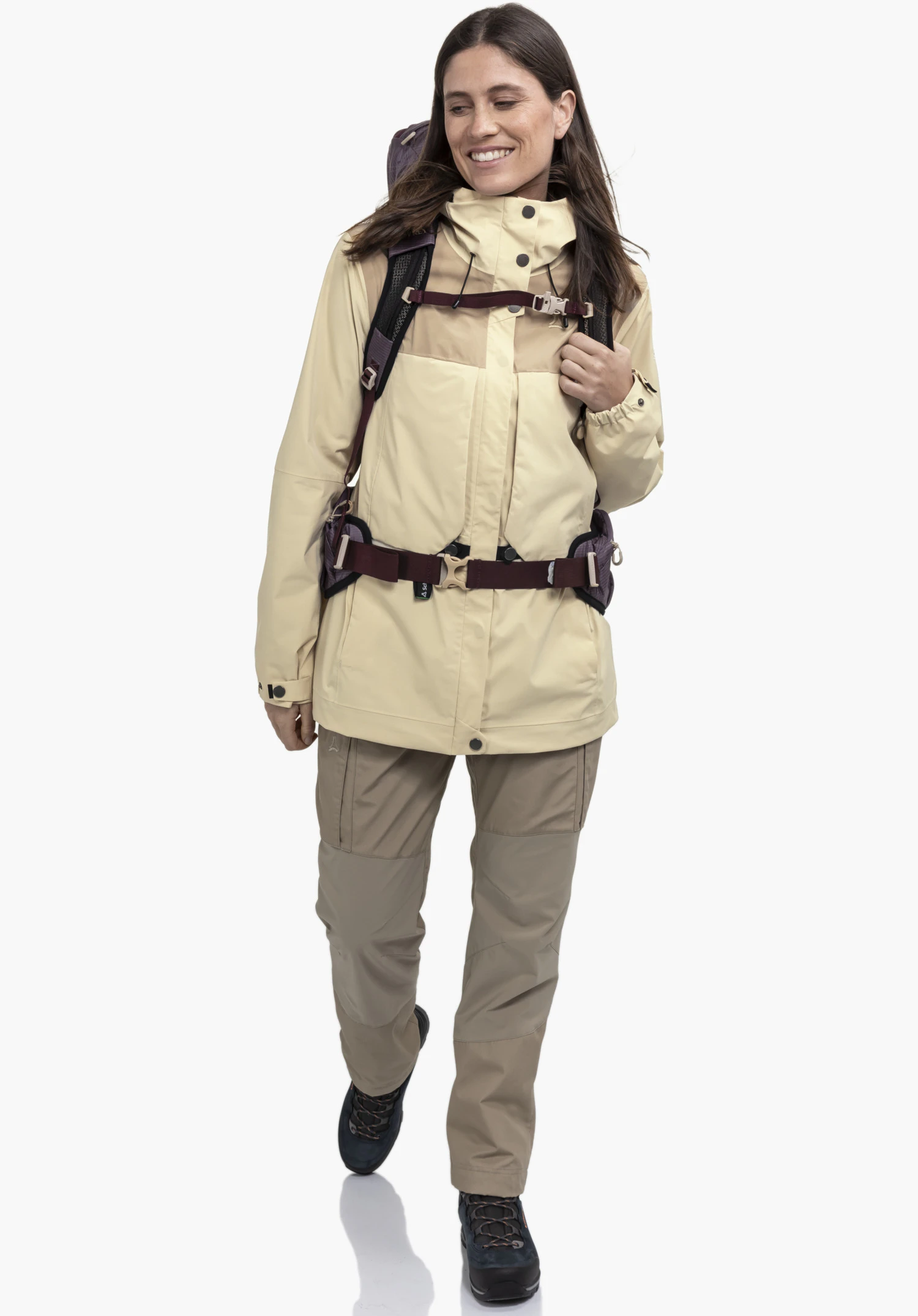 2L Jacket Style Maghera WMN shows the smooth, beige fabric texture and the front placket with contrasting dark press studs, as a close-up against a white background.