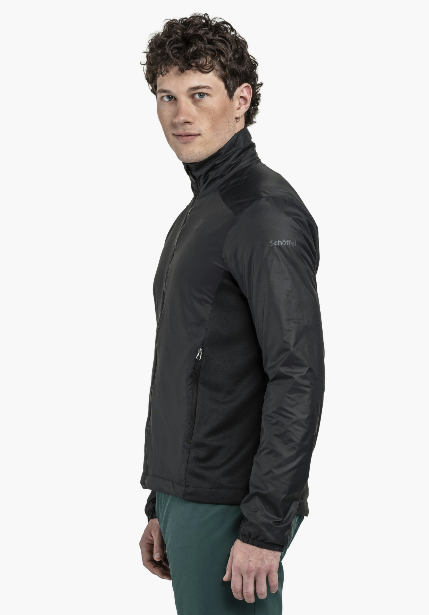 Ins Jacket Style Samaia MEN, worn by a model in black standing sideways against a neutral background, featuring a visible Schöffel logo on the sleeve.