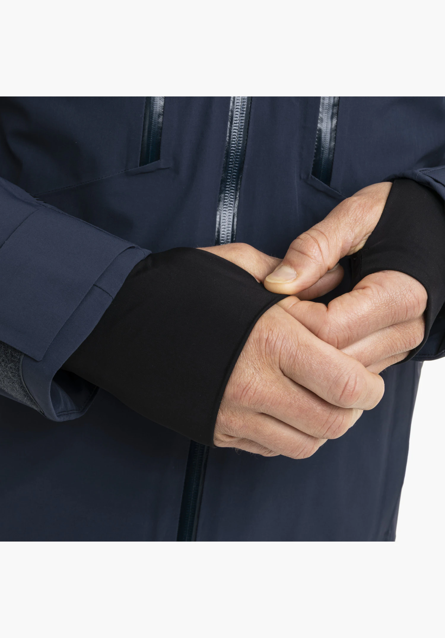 Jacket Style Safuna MEN in blue shows the detailed shot of the elastic cuff with thumb hole close-up against a white background.