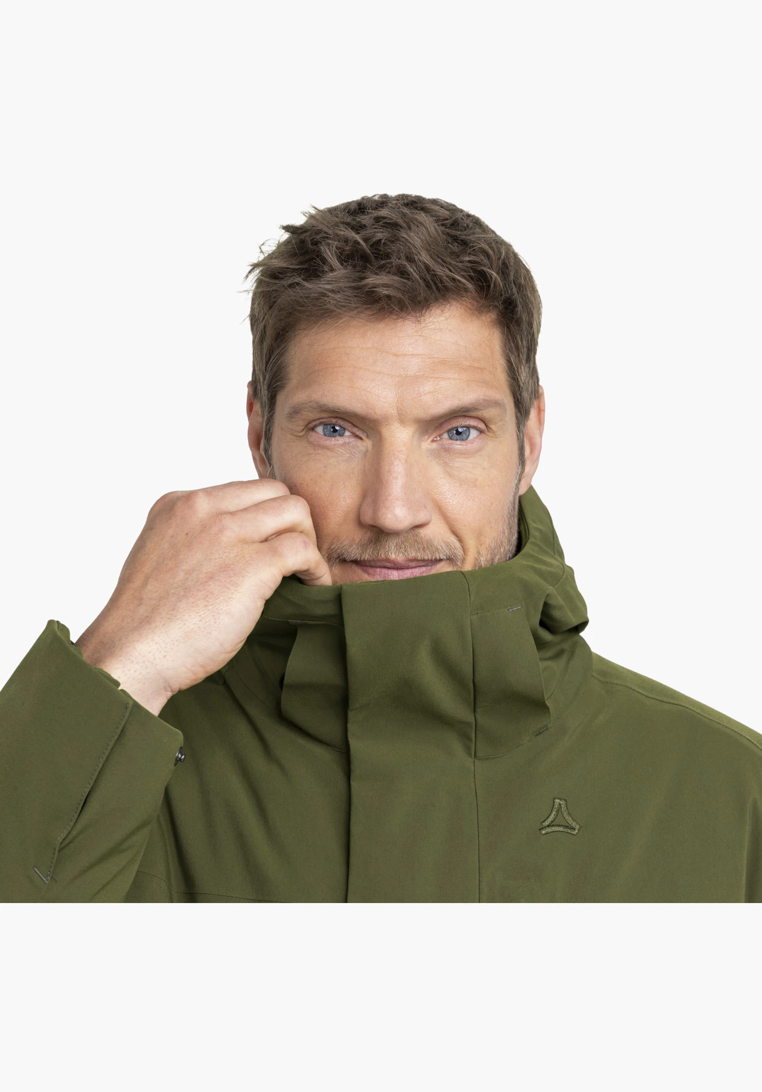 Ins Parka Style Optimea MEN with a high collar and subtle Schöffel logo in green in a close-up detail shot before a white background.