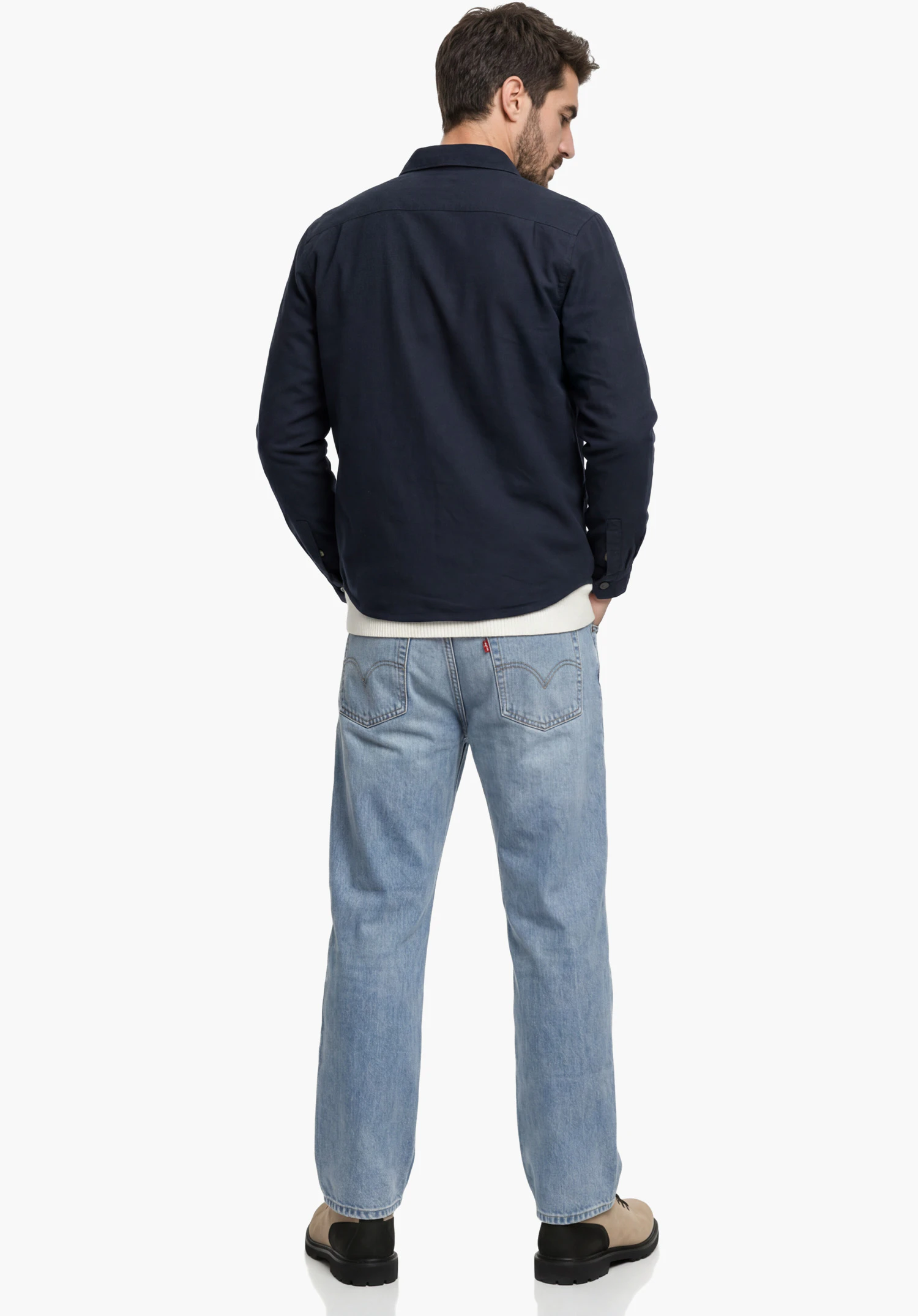 Overshirt Style Kalmor MEN in blue showing the back view focusing on the lower hem and cuffs in a close-up against a white background.