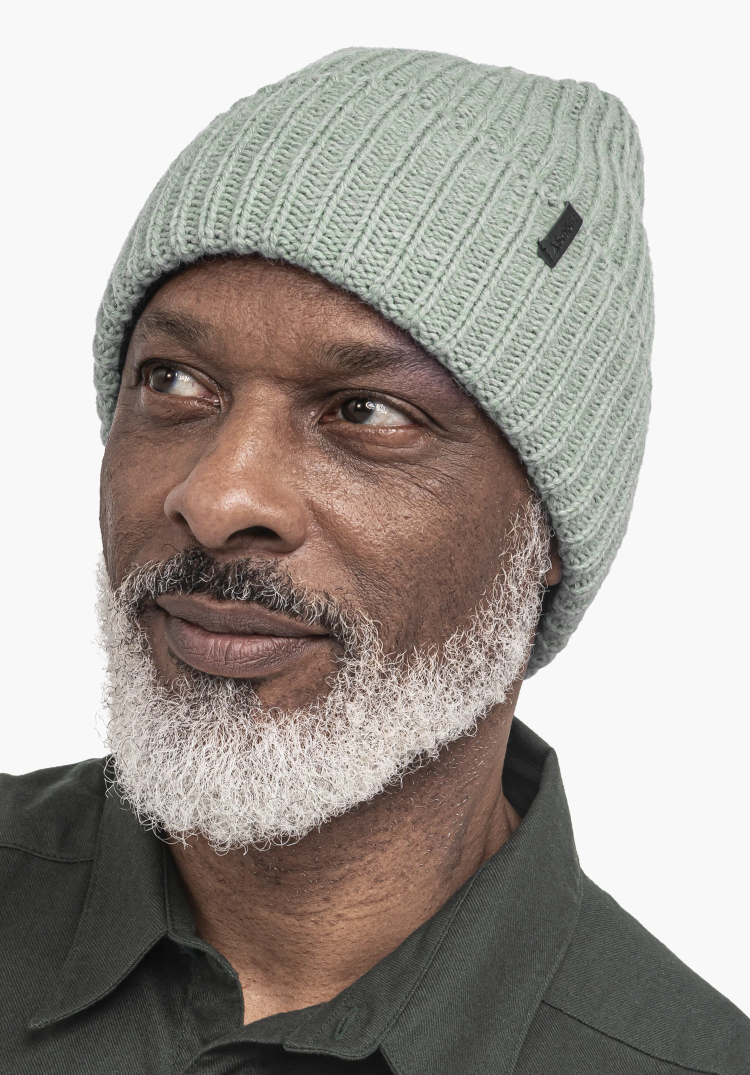 Knitted Hat Medford in grey with Schöffel lettering, worn by a male model in a back view against a white background. (AI-generated)