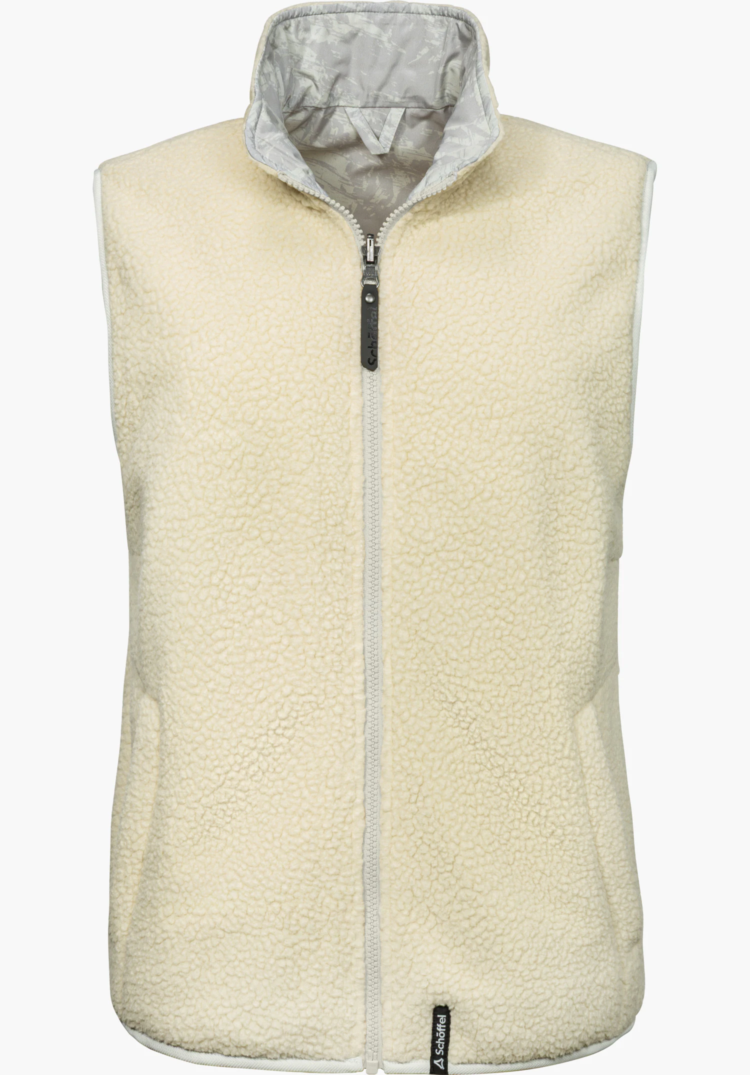 Vest Style Purga WMN reversible Sherpa fleece vest in beige with a full-length zipper, stand-up collar and subtle Schöffel lettering, shown from the front and isolated on a white background.